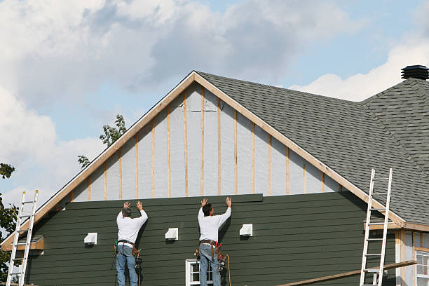 Professional Emergency Siding Repair technician working in Hawk Run, PA